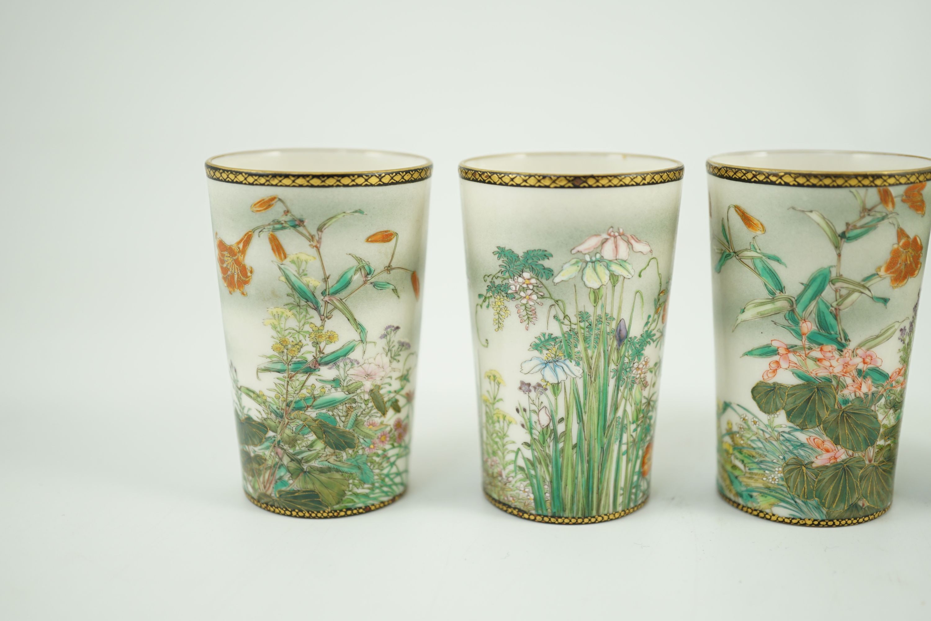 A set of four Japanese porcelain small cups, by Kinkozan, Meiji period, 6.2cm high